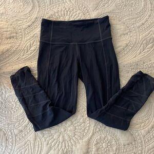 Athleta Dark Stormy Teal Mid-Calf Length Leggings with Zig Zag Patterned Bottom